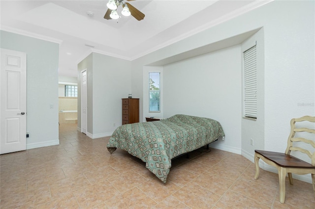 bedroom featuring ensuite bath, ceiling fan, ornamental molding, light tile patterned flooring, and a raised ceiling