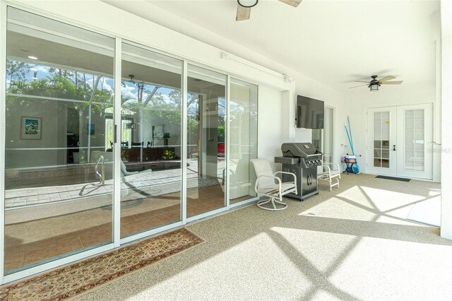 exterior space featuring french doors and ceiling fan