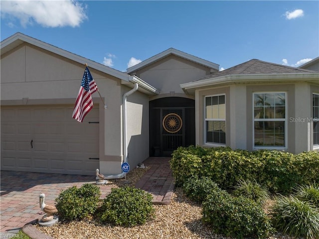 view of front of property featuring a garage