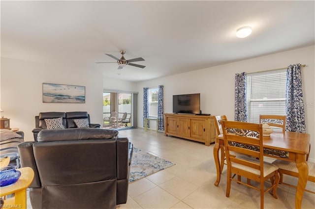 living room featuring ceiling fan and light tile patterned floors