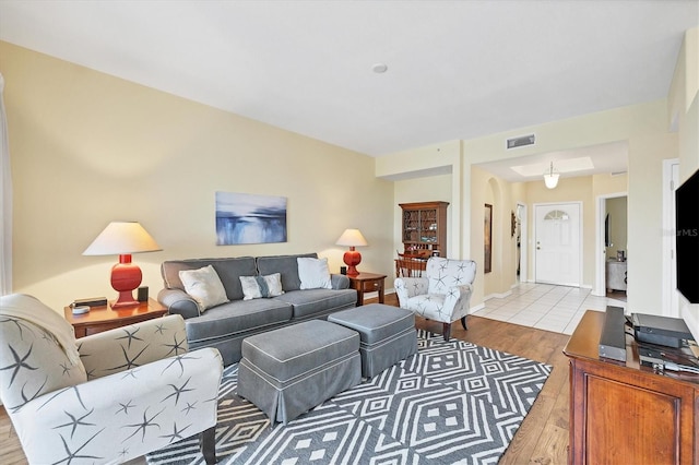 living room with light hardwood / wood-style floors