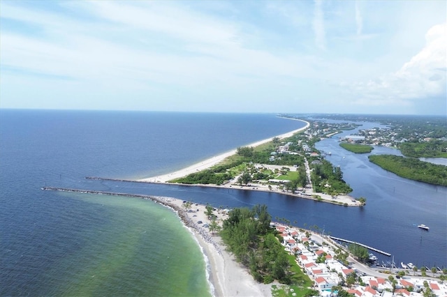 bird's eye view featuring a beach view and a water view