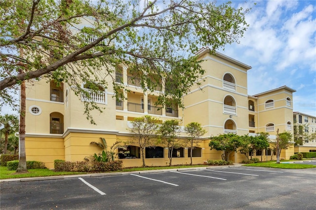 980 Cooper St Unit 302, Venice, FL 34285 - view of property featuring uncovered parking