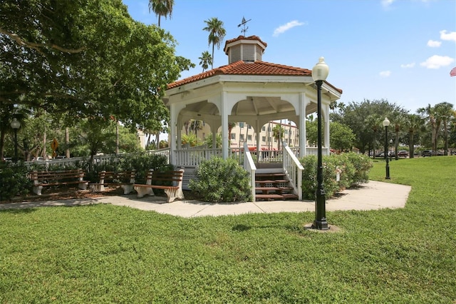 surrounding community featuring a gazebo and a yard