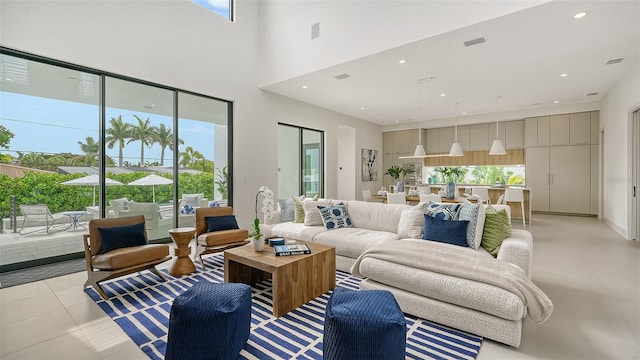 tiled living room featuring plenty of natural light