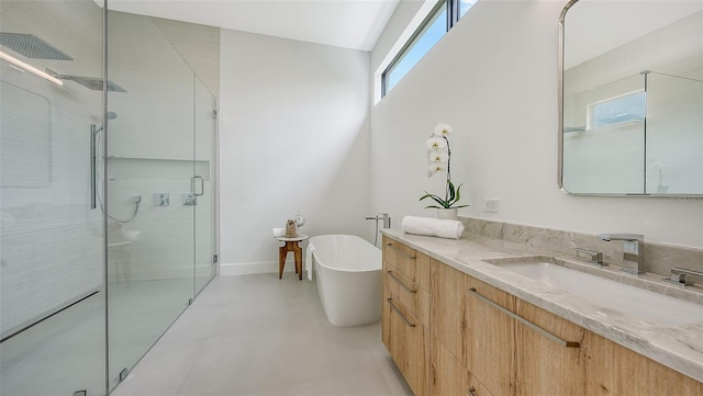 bathroom featuring vanity and plus walk in shower