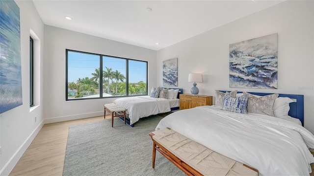 bedroom featuring light wood-type flooring