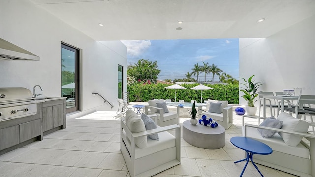 view of patio / terrace featuring area for grilling, an outdoor living space, and sink