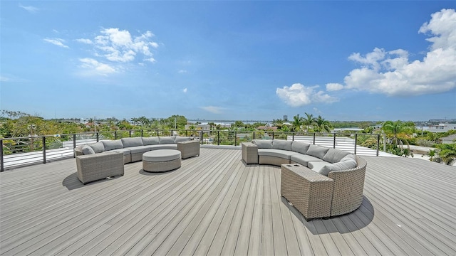 wooden deck featuring outdoor lounge area