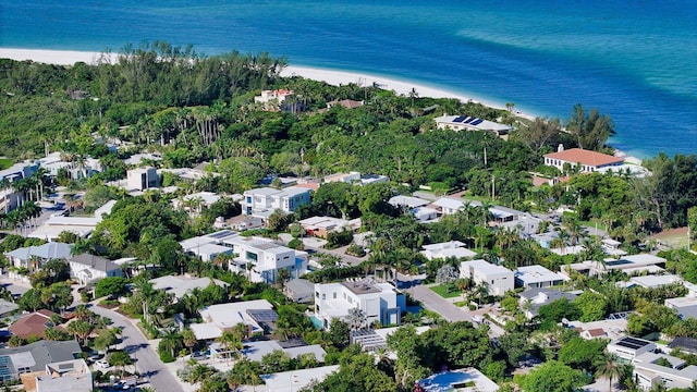 aerial view with a beach view and a water view