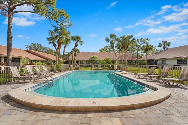 view of swimming pool featuring a patio