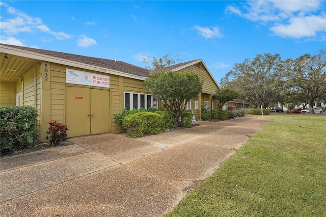 exterior space featuring a yard