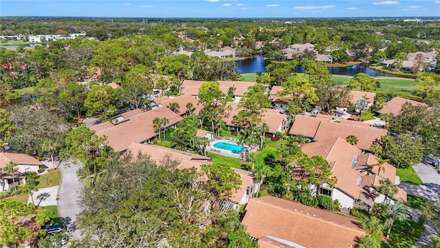 aerial view with a water view and a residential view