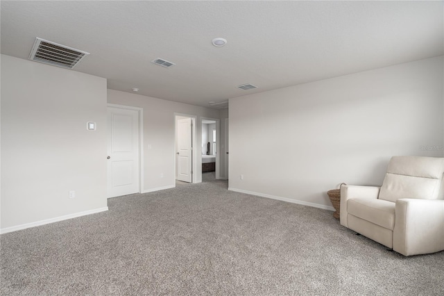 unfurnished room featuring carpet flooring