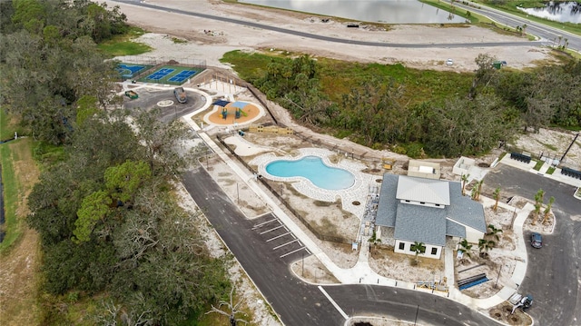 birds eye view of property featuring a water view