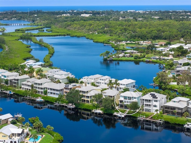 drone / aerial view with a water view