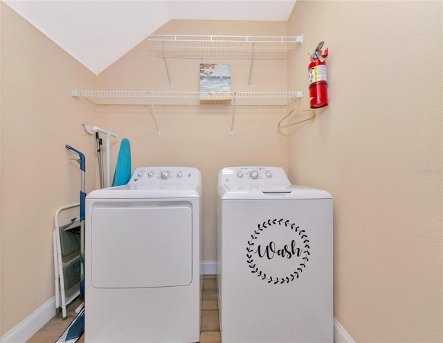 washroom with washer and clothes dryer