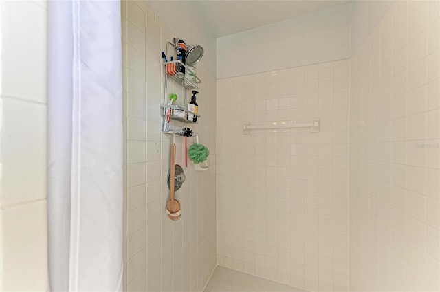 bathroom with a shower with shower curtain