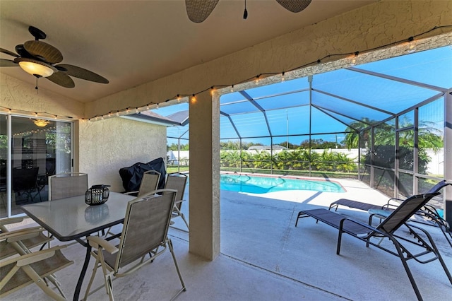 4135 Dover Dr E, Bradenton, FL 34203 - view of patio / terrace with ceiling fan, an outdoor pool, and glass enclosure