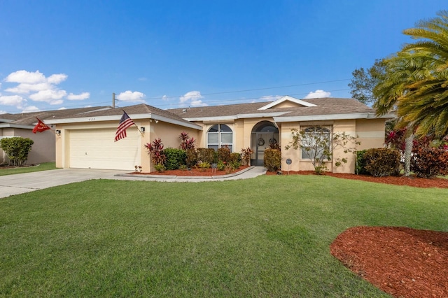 ranch-style house featuring a front yard and a garage