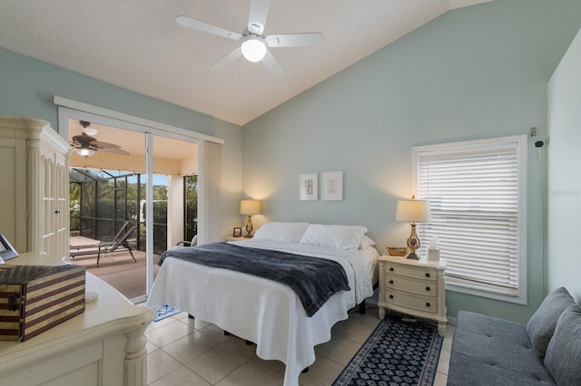 bedroom featuring lofted ceiling, multiple windows, access to exterior, light tile patterned flooring, and ceiling fan