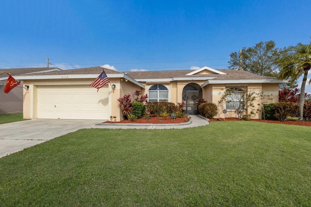 single story home featuring a front yard and a garage