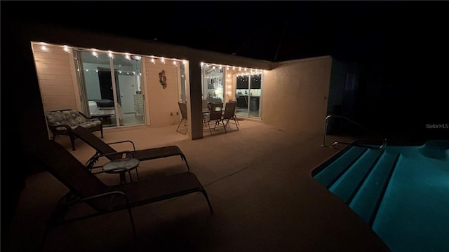 view of patio at twilight