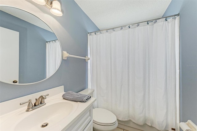 4135 Dover Dr E, Bradenton, FL 34203 - bathroom featuring toilet, vanity, and a textured ceiling