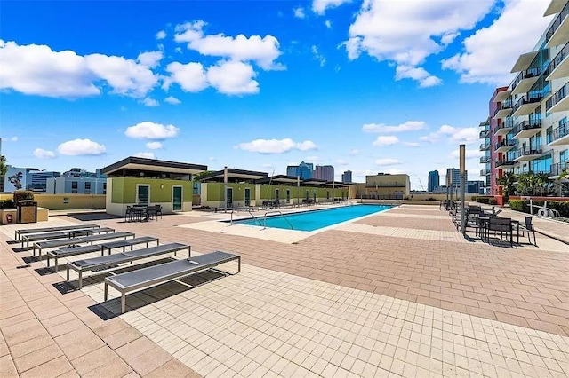 view of swimming pool featuring a patio area