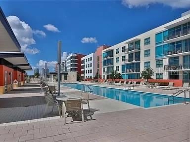 view of swimming pool featuring a patio area