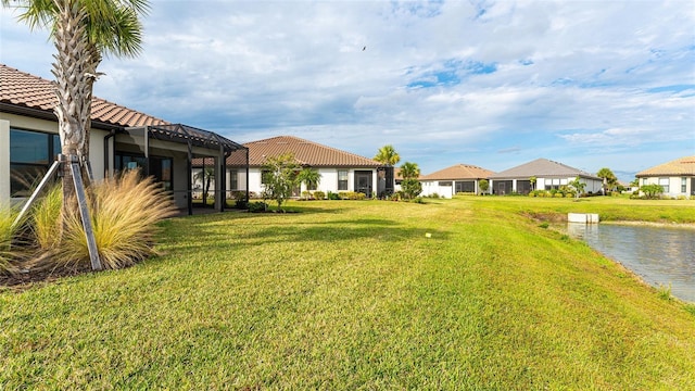 5431 Taliaferro Ct, Palmetto, FL 34221 - view of green lawn with a water view and a residential view