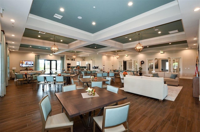 dining room featuring beam ceiling, dark hardwood / wood-style floors, and coffered ceiling