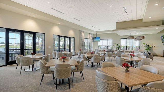 5431 Taliaferro Ct, Palmetto, FL 34221 - dining area with carpet flooring and recessed lighting