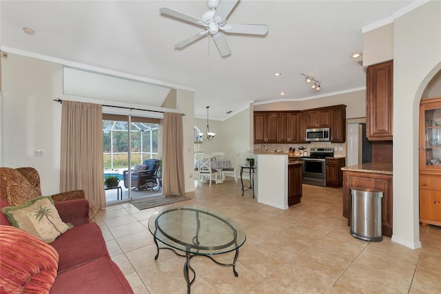 living room featuring ceiling fan, crown molding, and light tile patterned flooring