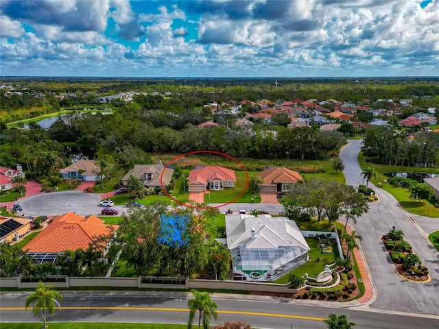 bird's eye view featuring a residential view and a water view