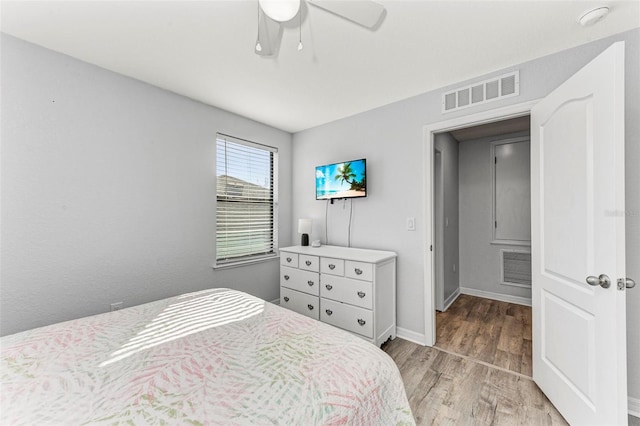 bedroom featuring ceiling fan and light hardwood / wood-style flooring