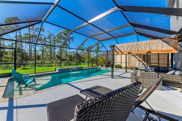 view of pool with glass enclosure, pool water feature, an outdoor living space, and a patio area