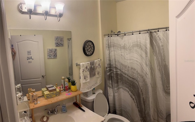 2271 50th Street Cir E, Palmetto, FL 34221 - full bath with a sink, toilet, and a shower with shower curtain