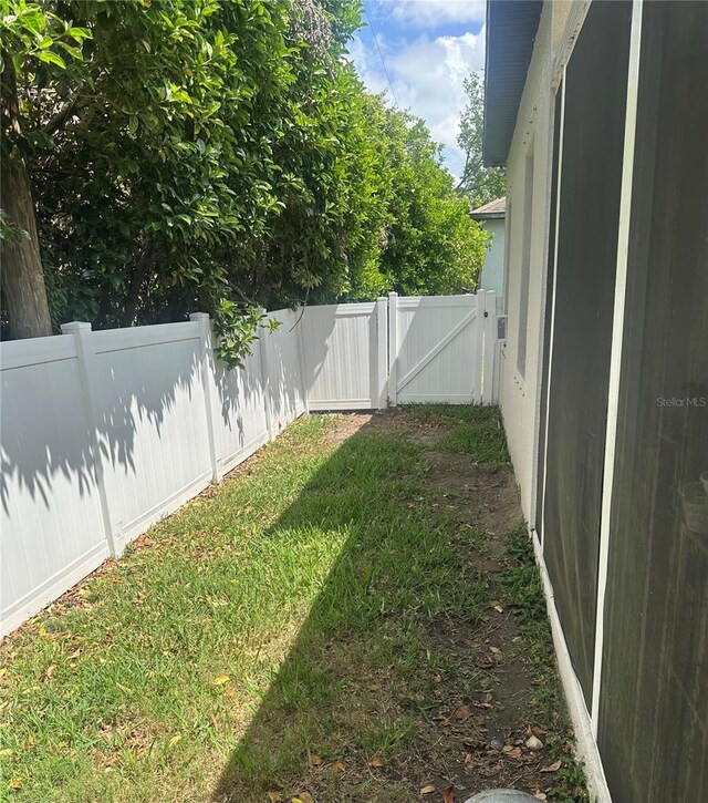 2271 50th Street Cir E, Palmetto, FL 34221 - view of yard with a gate