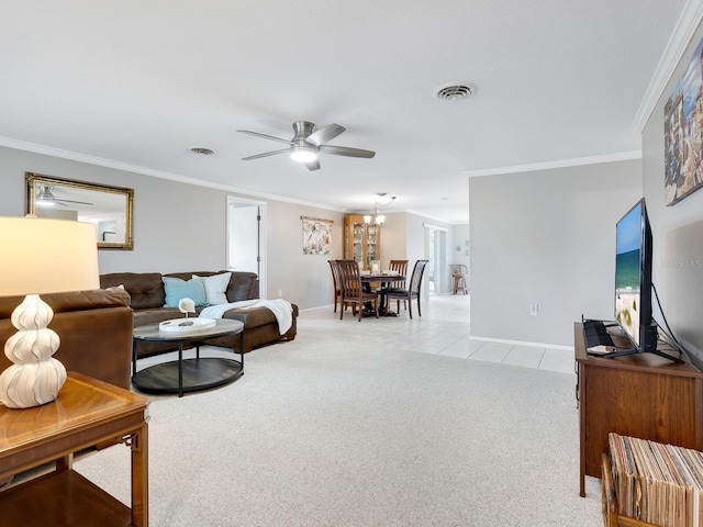 living room with ceiling fan, light carpet, and crown molding