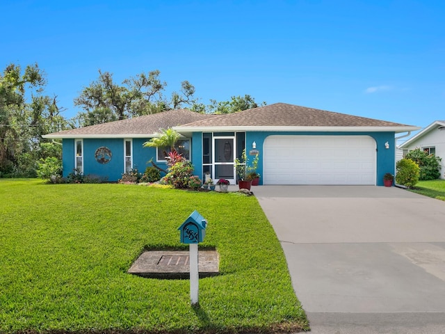 ranch-style home with a garage and a front lawn