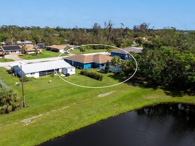 drone / aerial view with a water view