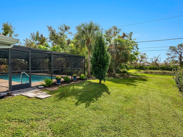 view of yard featuring a lanai