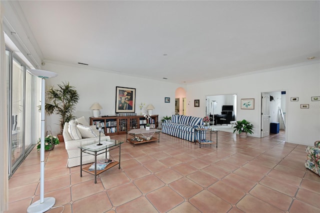 tiled living room featuring crown molding