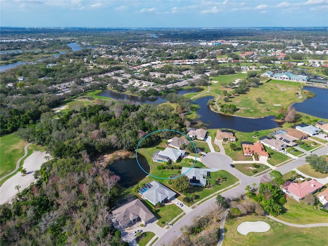 bird's eye view with a water view