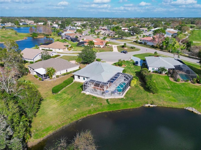 drone / aerial view with a water view