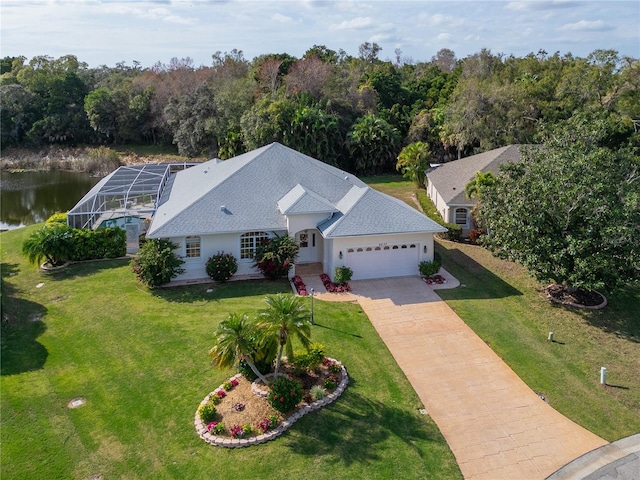 birds eye view of property with a water view