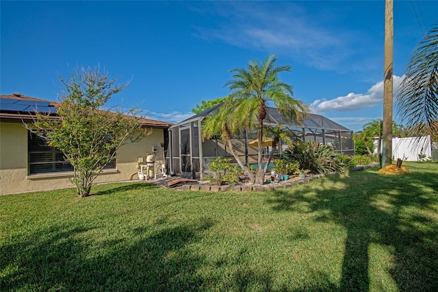 view of yard featuring glass enclosure