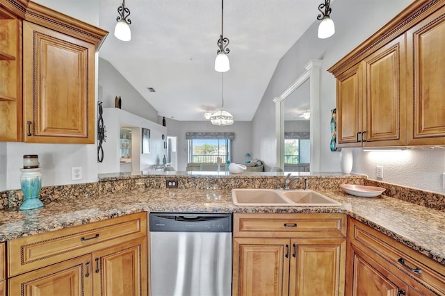 kitchen with pendant lighting, sink, an inviting chandelier, vaulted ceiling, and dishwasher