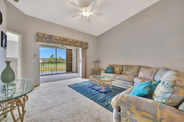 living room with carpet, ceiling fan, and high vaulted ceiling